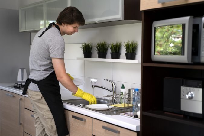 man-servant-cleaning-house (1)